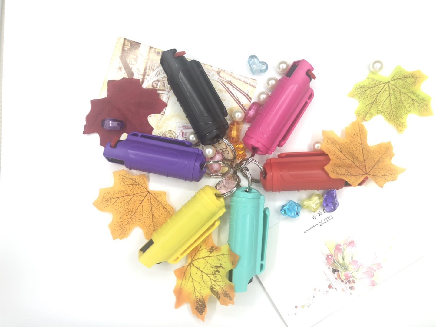 宝青坊贝斯达炫彩钥匙扣防狼喷雾实物展示 钥匙扣防狼喷雾成分与生产工艺解析